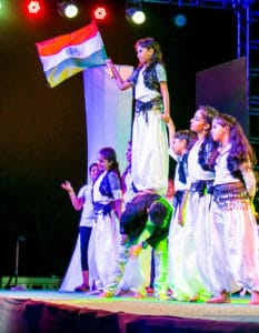 A group of girl students are dancing with Indian national flag on the day of independence day in their cbse school in Chennai.