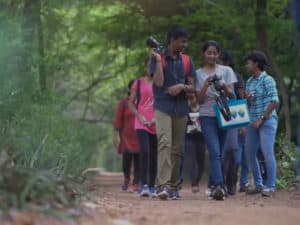 Group of students learning photography through field trips