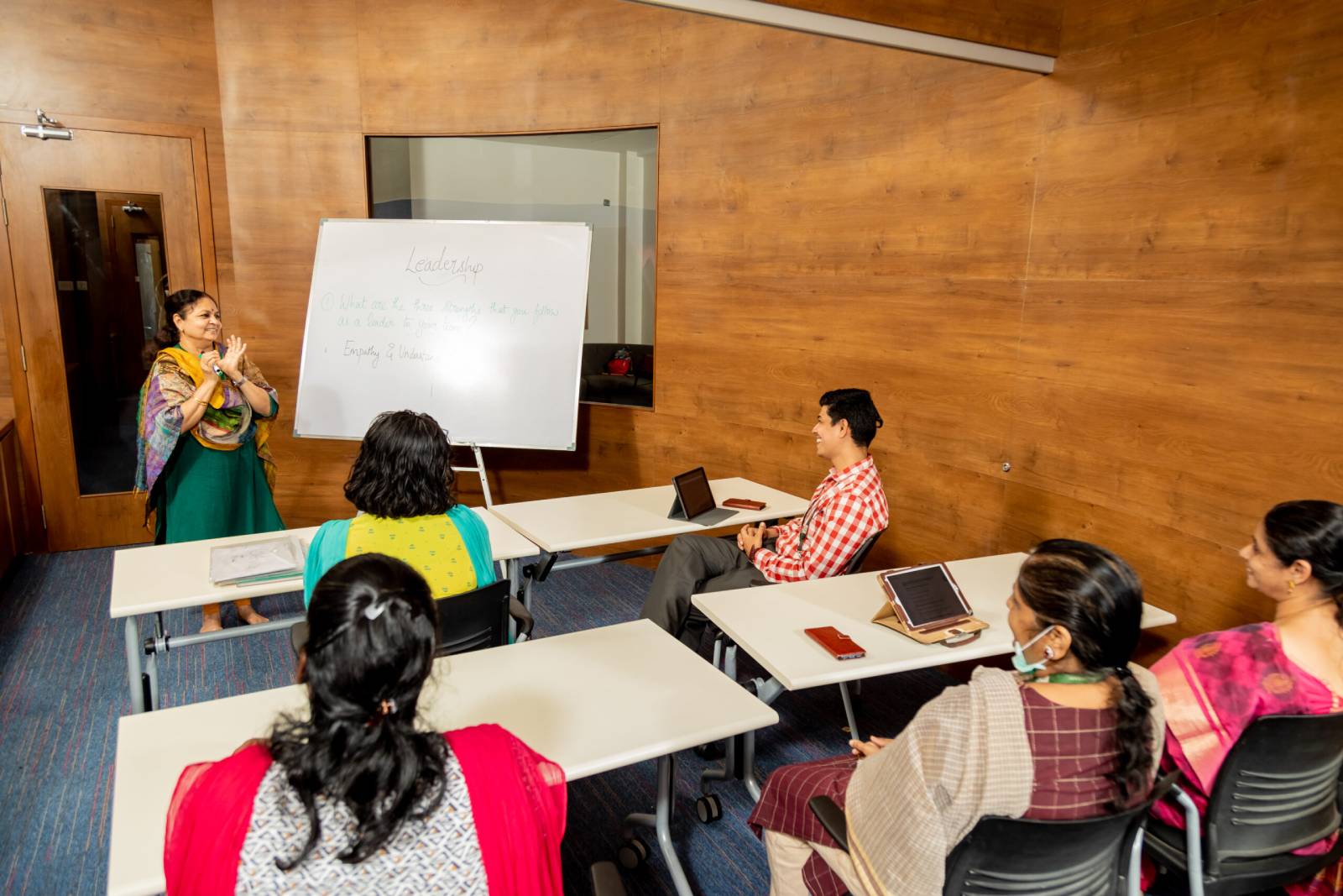 A group of teachers are getting trained under the guidance of a senior staff in the event of teacher training program, held in a cbse affiliated school in Chennai.